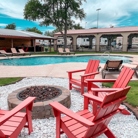 fire pit and pool area at Great Escapes Austin Oaks
